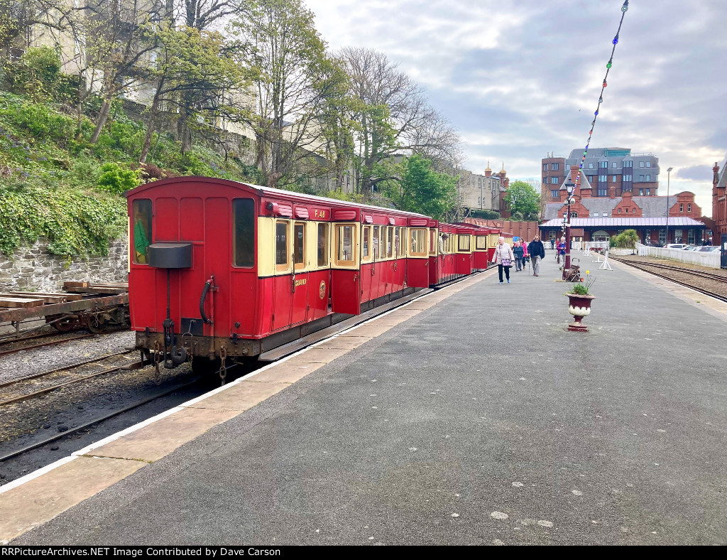 A typical passenger train of the Isle of Man Steam Railway awaiting its loco